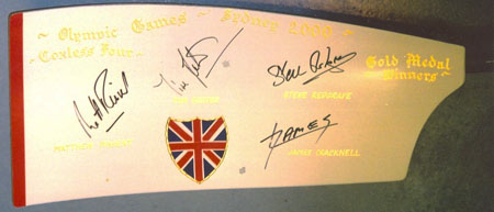 A G.B blade signed by the Sydney 2000 coxless IV Olympic champions, Pinsent, Redgrave, Cracknell and Foster. This was used for a charity fund raising event